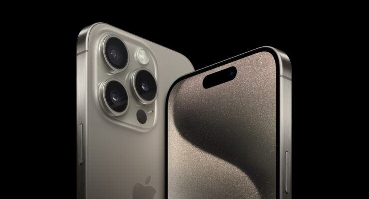 The iPhone 15 Pro and iPhone 15 Pro Max in the natural titanium finish.